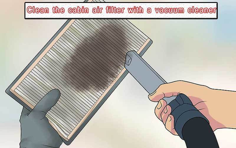 Clean the cabin air filter with a vacuum cleaner